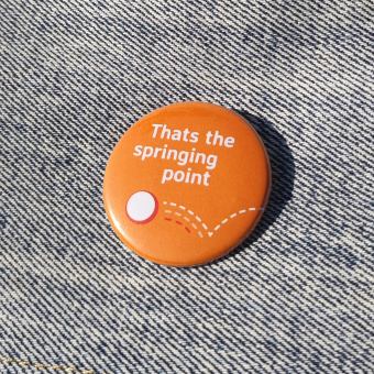 Ansteckbutton Thats the springing point auf Jeans